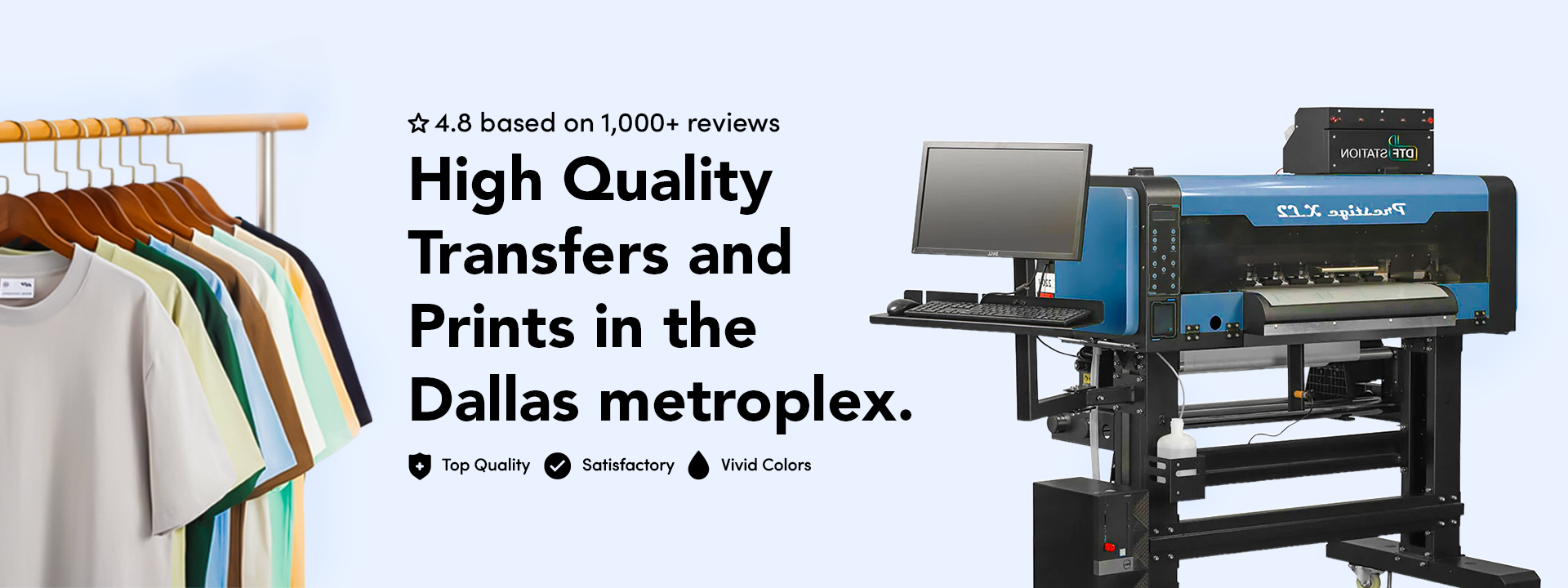 Promotional banner for a high-quality transfer and print service, featuring a large blue and black industrial printer on the right, a rack of colorful t-shirts on the left, and large text in the center reading 'High Quality Transfers and Prints in the Dallas metroplex.'.